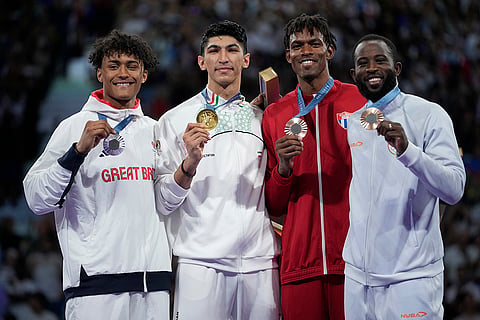 Men's over 80kg Taekwondo: Britain's Caden Cunningham (Silver), Iran's Arian Salimi (Gold), Ivory Coast's Cheick Sallah (Bronze), and Cuba's Rafael Alba (Bronze)